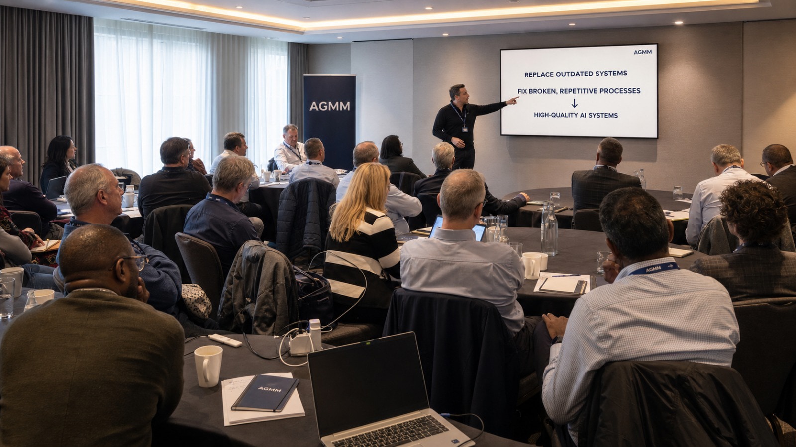 An AGMM workshop with business leaders learning how to improve outdated systems and repetitive processes